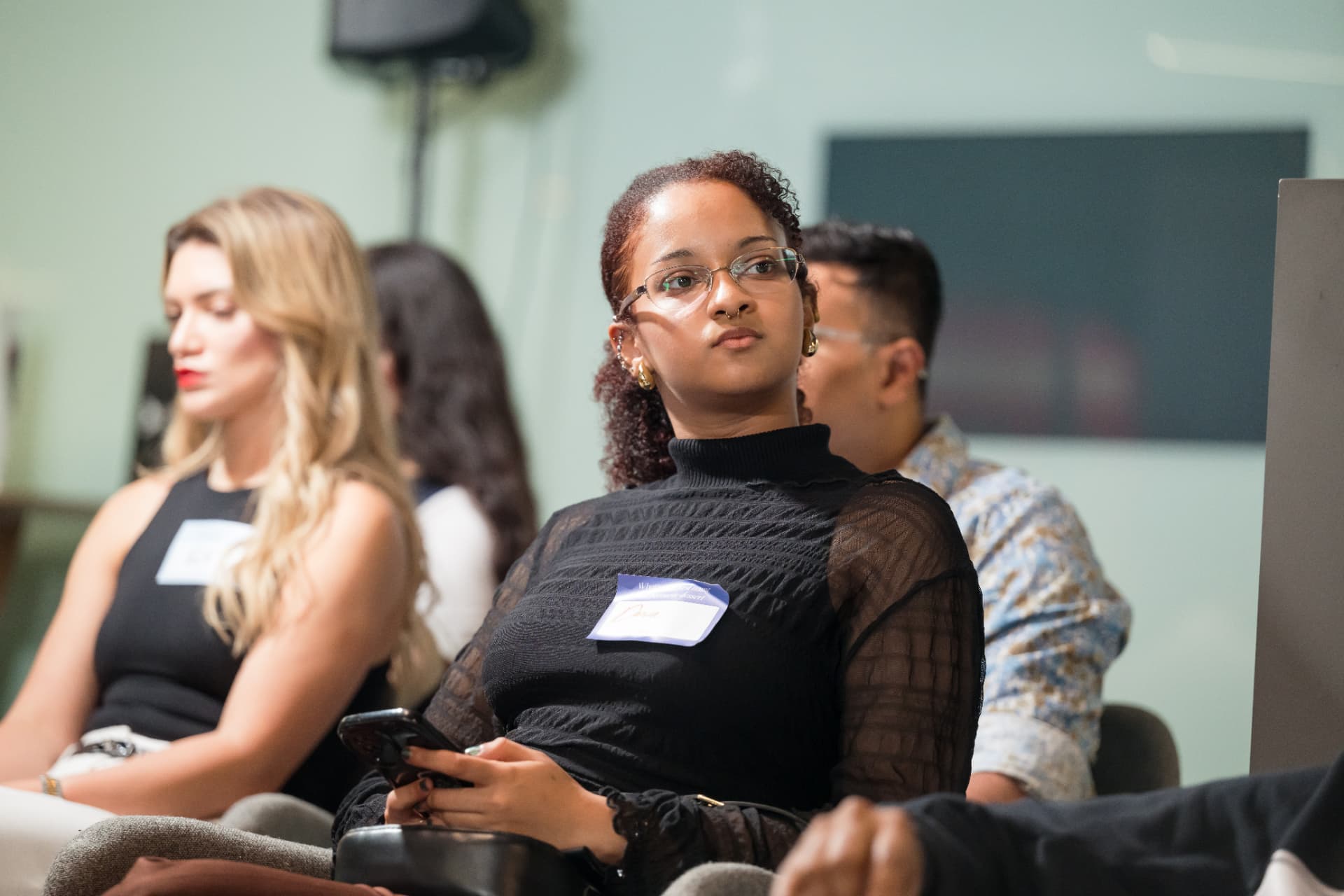 An attendee listening during a TechFest session