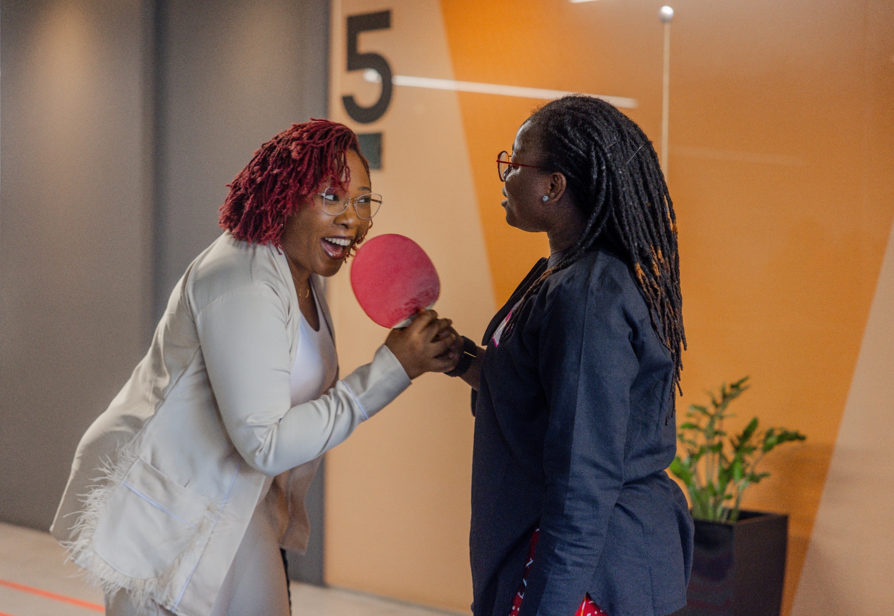 Tribe creatives playing table tennis